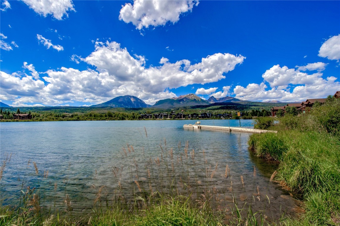 596 Fly Line Drive Silverthorne, CO 80498 - Photo 29 of 32 a view of a lake with a mountain in the background