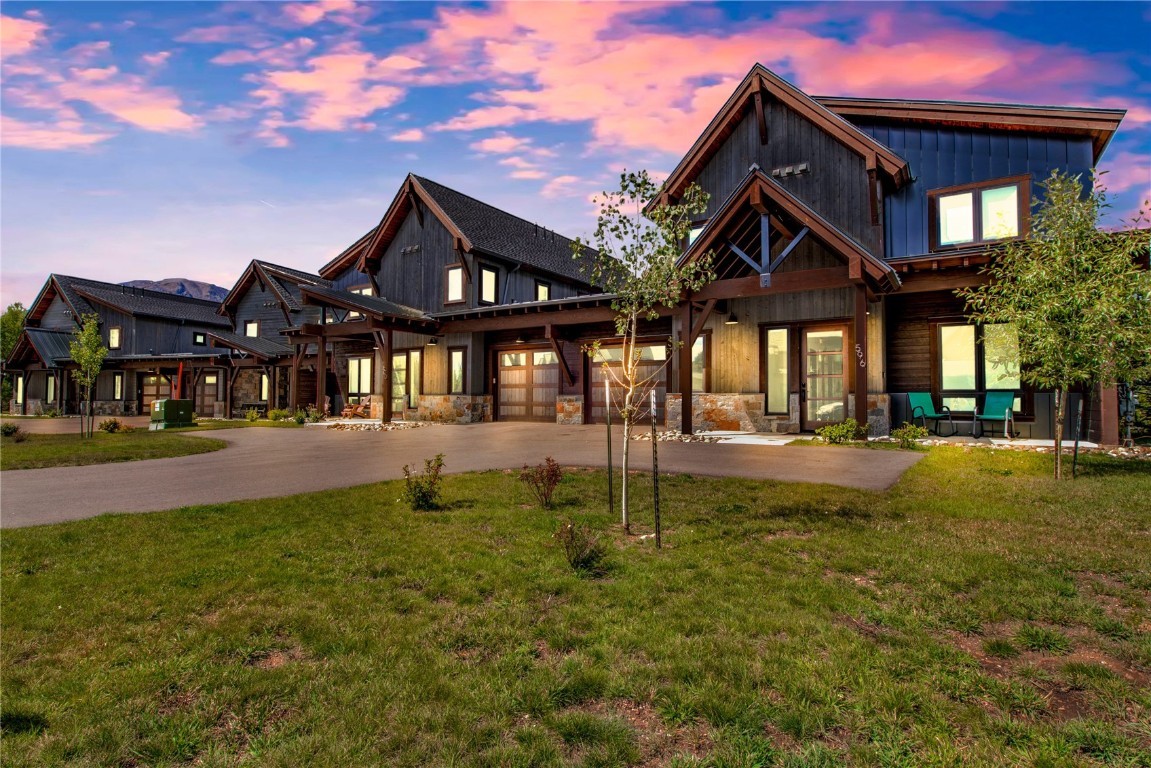596 Fly Line Drive Silverthorne, CO 80498 - Photo 32 of 32 a front view of a house with garden