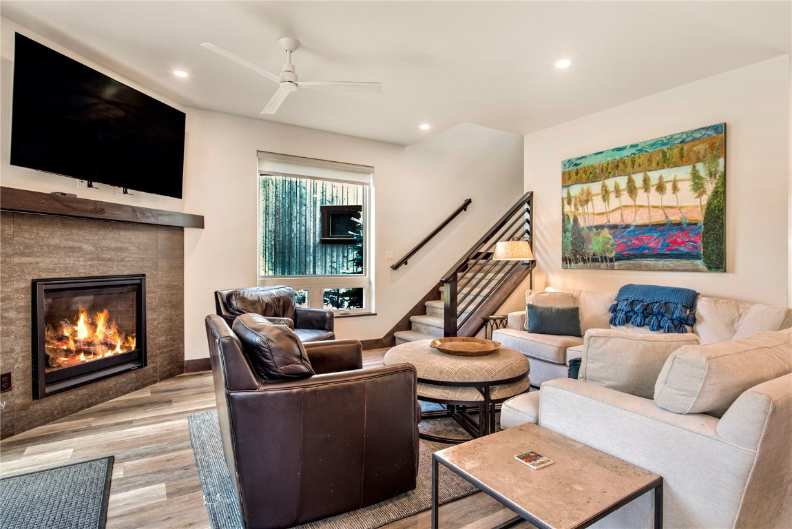 596 Fly Line Drive Silverthorne, CO 80498 - Photo 4 of 32 a living room with furniture and a flat screen tv
