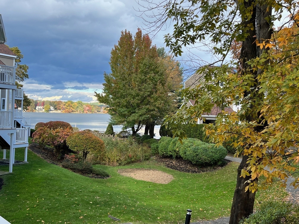 46 Pointe Rok Drive, Unit 46 Worcester, MA 01604 - Photo 19 of 23 a view of a garden with lawn chairs