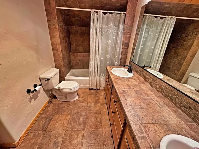 a view of a house with a mountain