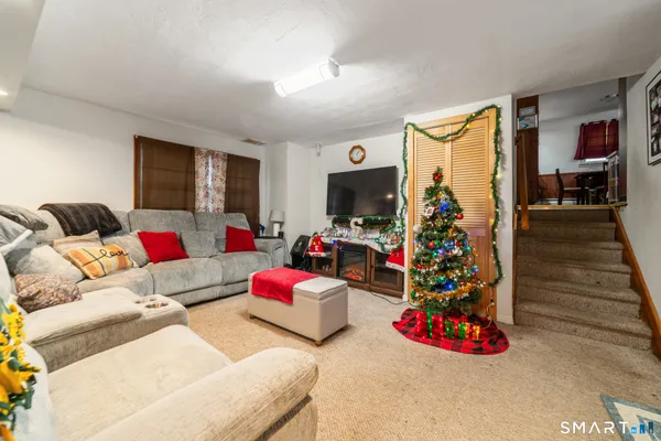 a living room with furniture and a couch