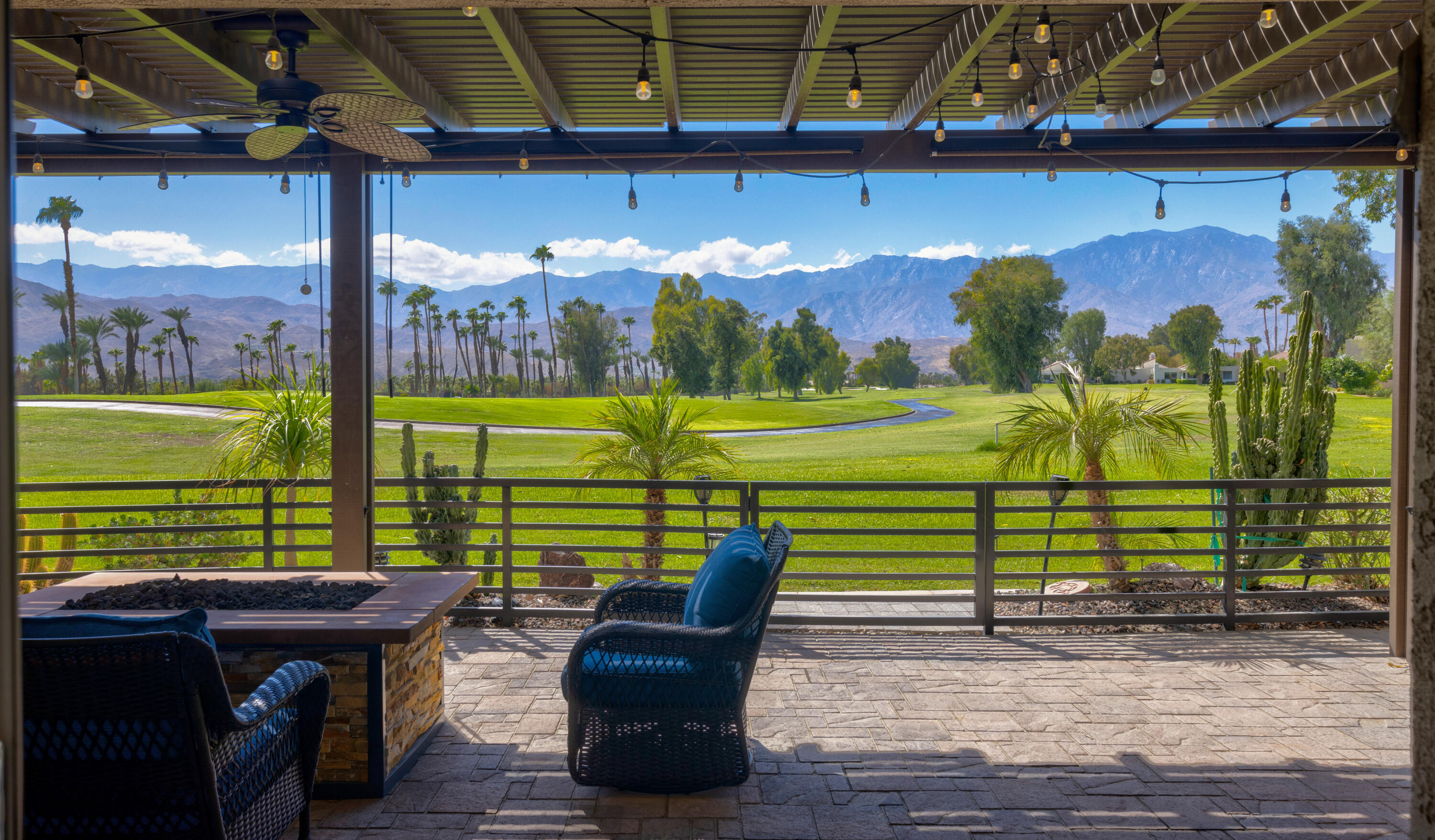 836 Inverness Drive Rancho Mirage, CA 92270 - Photo 1 of 29 a view of a two chair in the patio