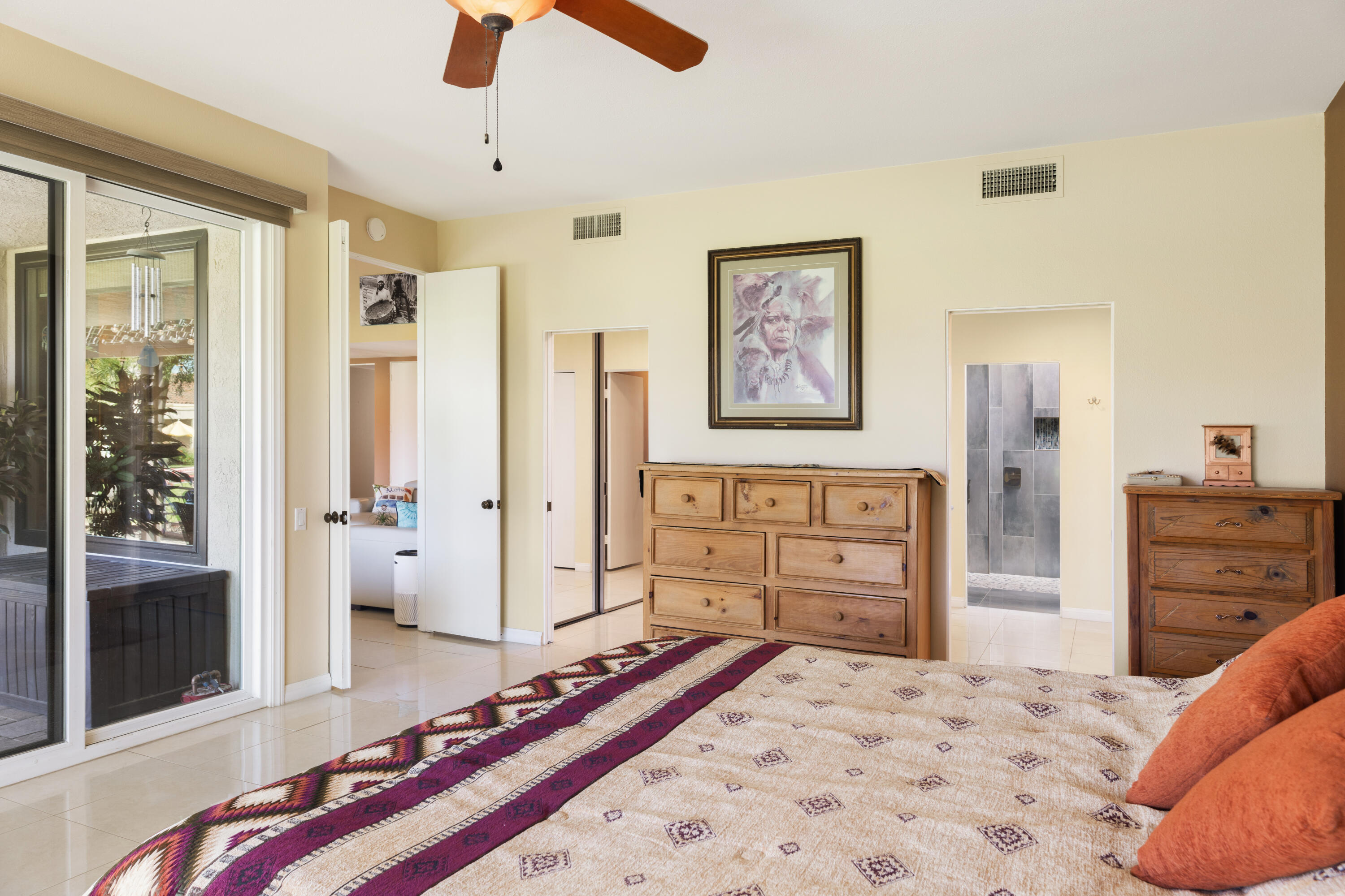 836 Inverness Drive Rancho Mirage, CA 92270 - Photo 13 of 29 a bedroom with a bed and wooden floor