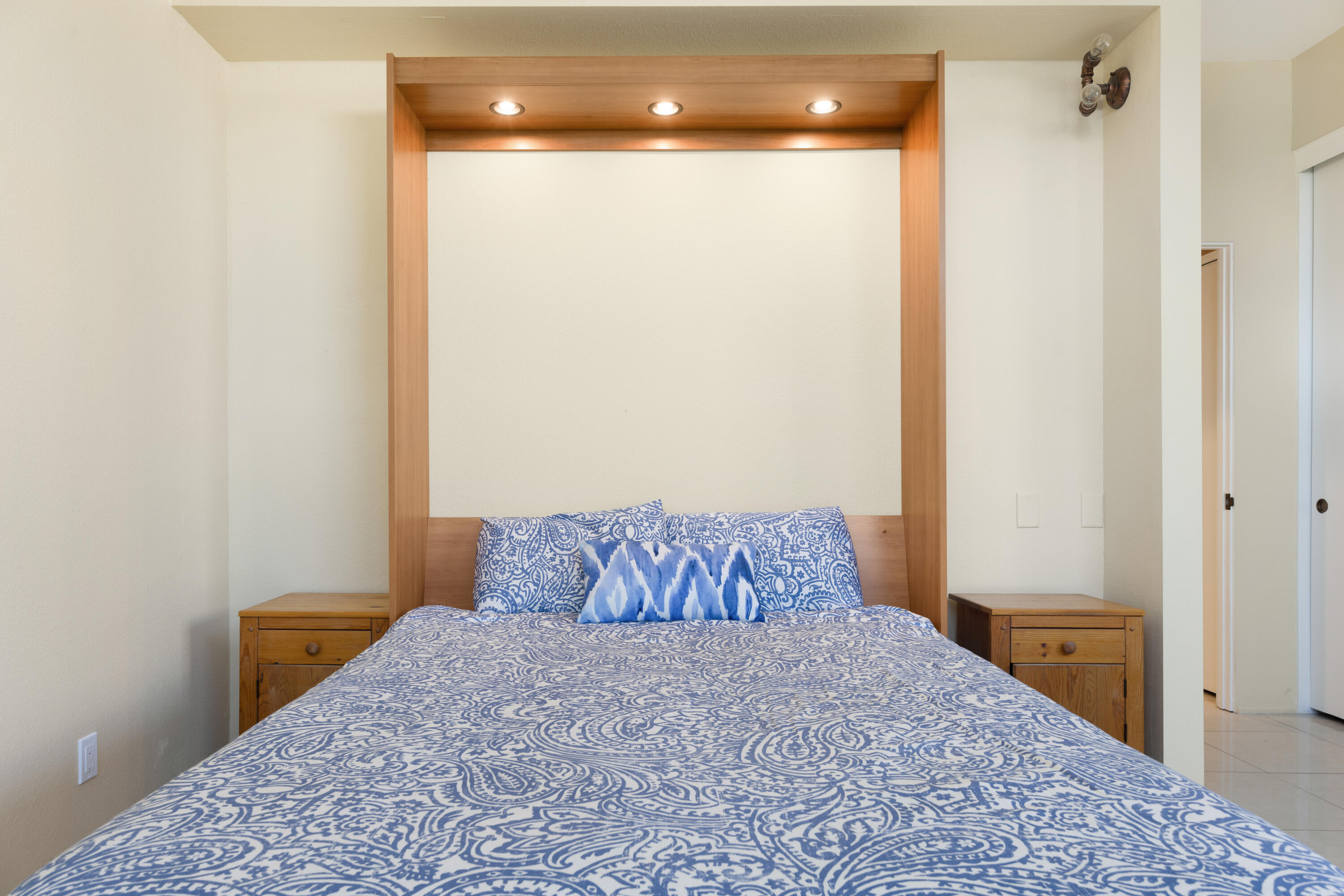 836 Inverness Drive Rancho Mirage, CA 92270 - Photo 15 of 29 a bedroom with a bed and a chandelier