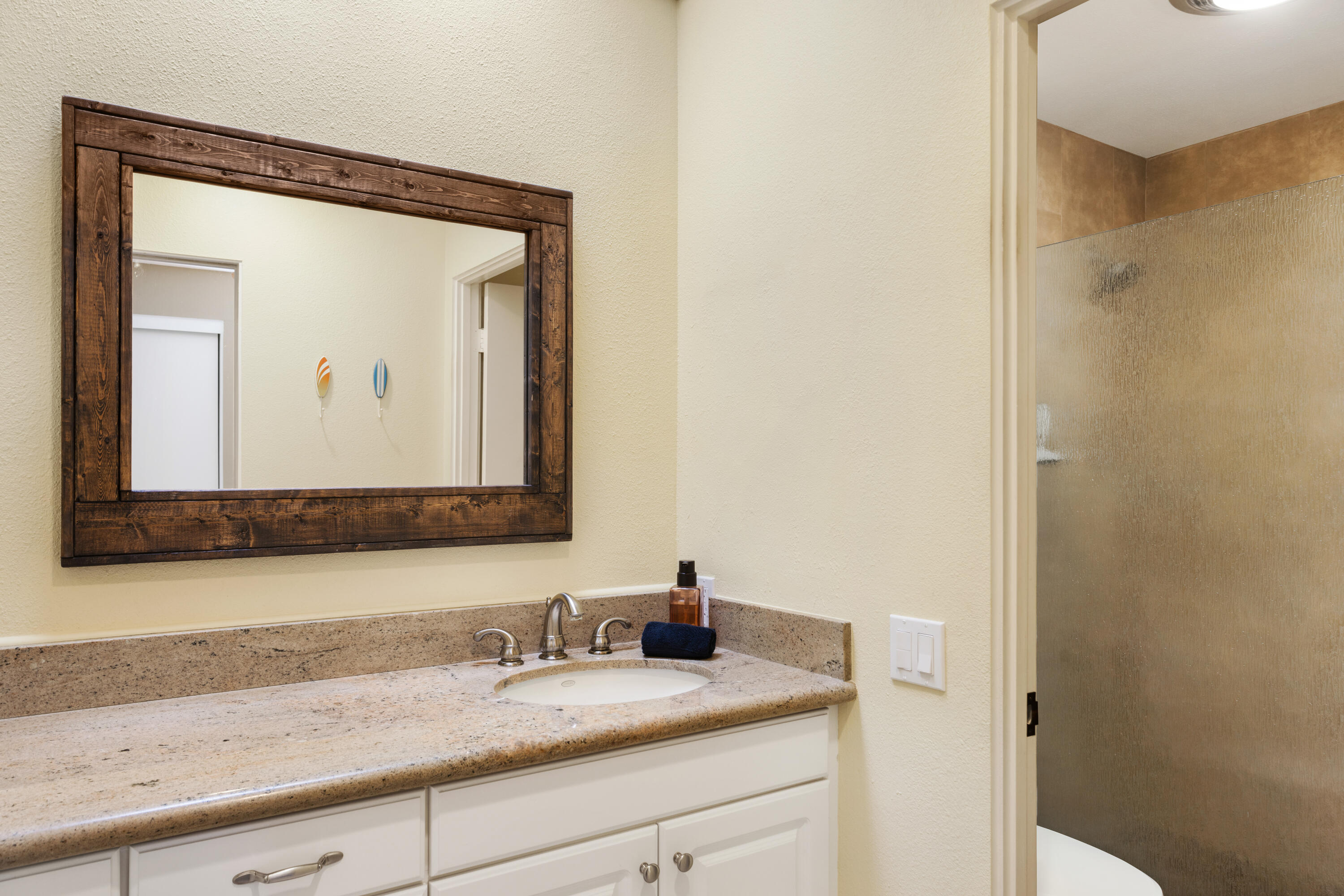 836 Inverness Drive Rancho Mirage, CA 92270 - Photo 19 of 29 a bathroom with a sink and a mirror