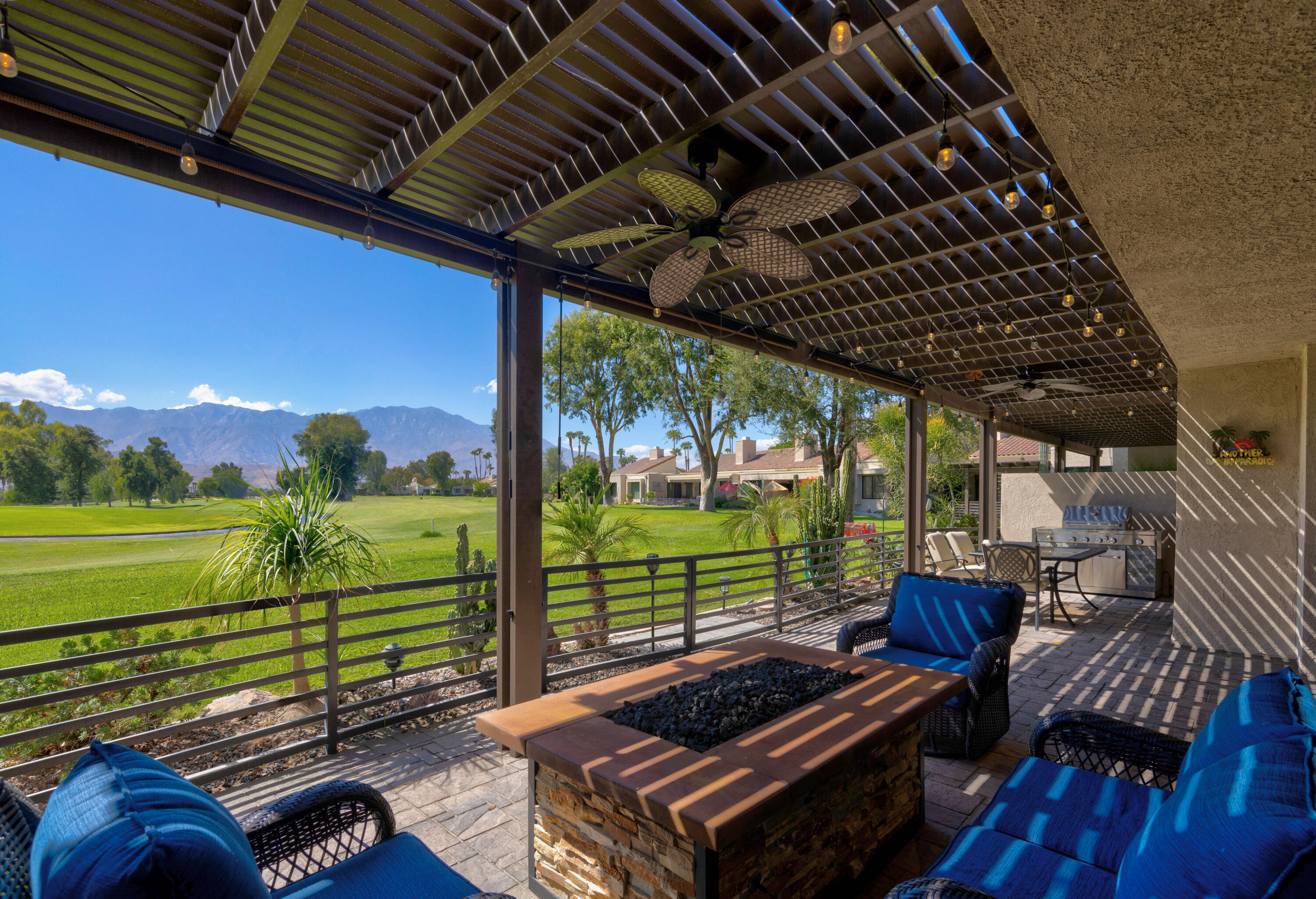 836 Inverness Drive Rancho Mirage, CA 92270 - Photo 2 of 29 a view of a patio with wooden floor outdoor seating and yard