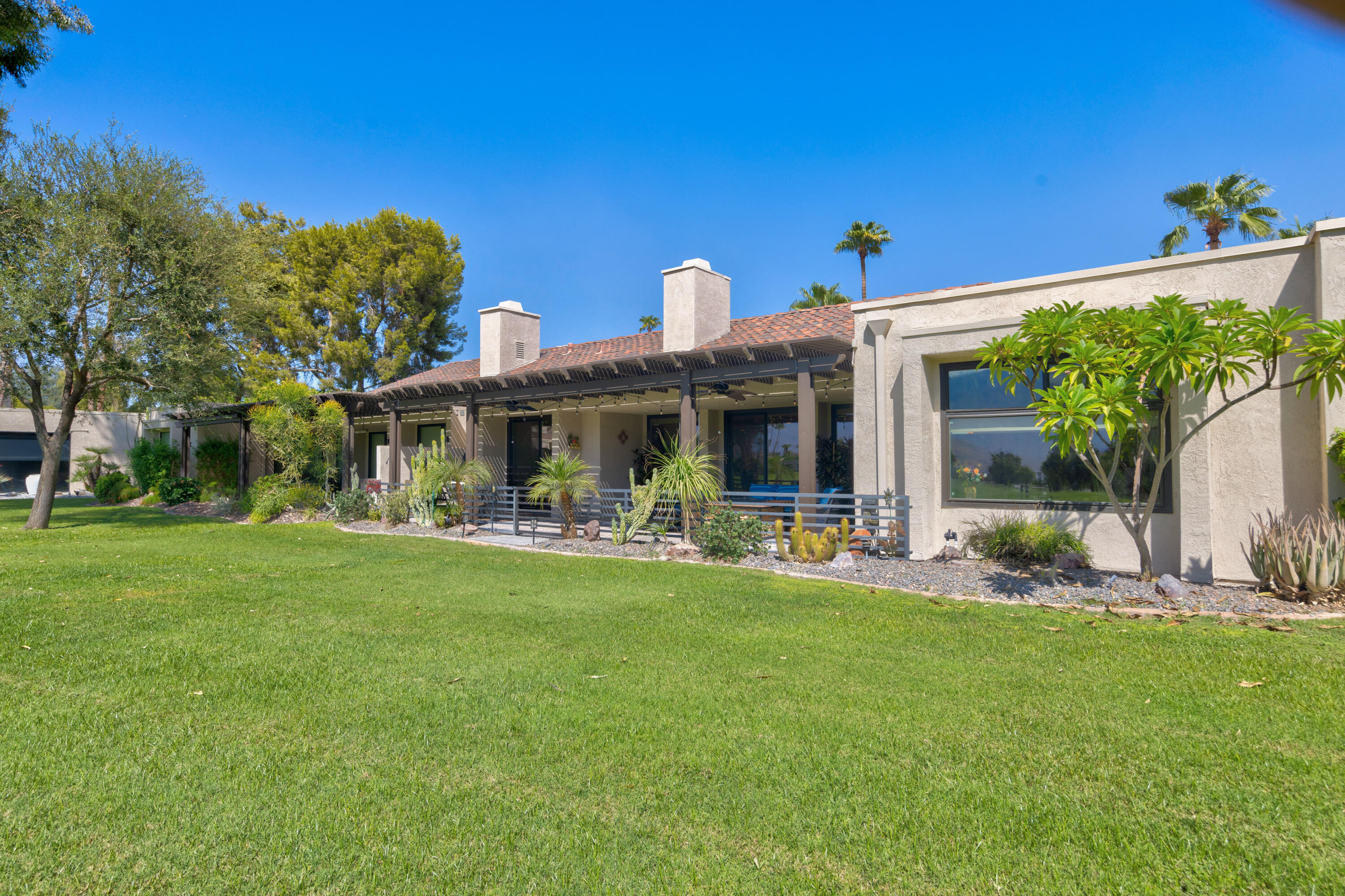 836 Inverness Drive Rancho Mirage, CA 92270 - Photo 27 of 29 a view of a house with backyard porch and garden
