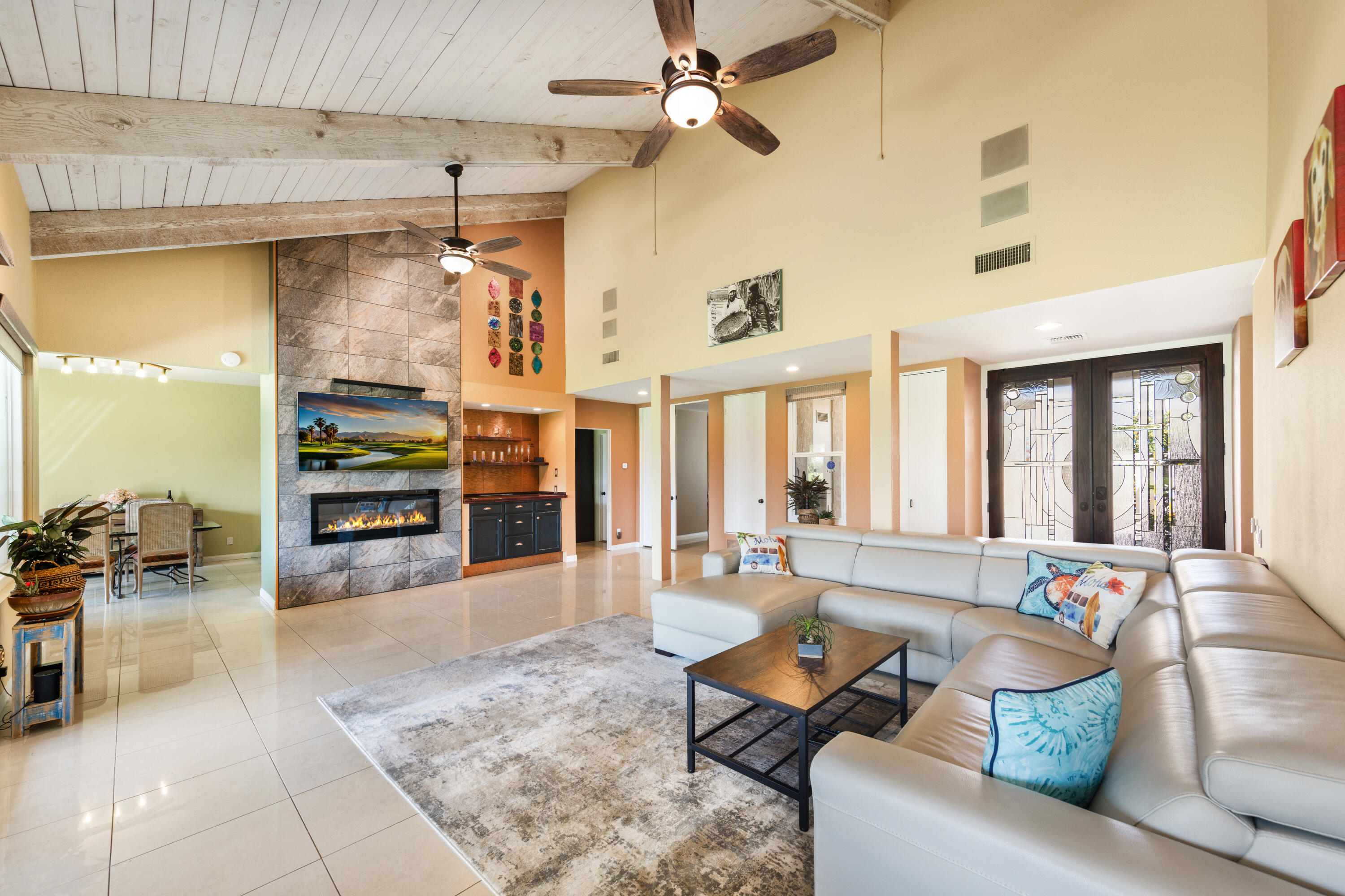 836 Inverness Drive Rancho Mirage, CA 92270 - Photo 3 of 29 a living room with furniture and wooden floor