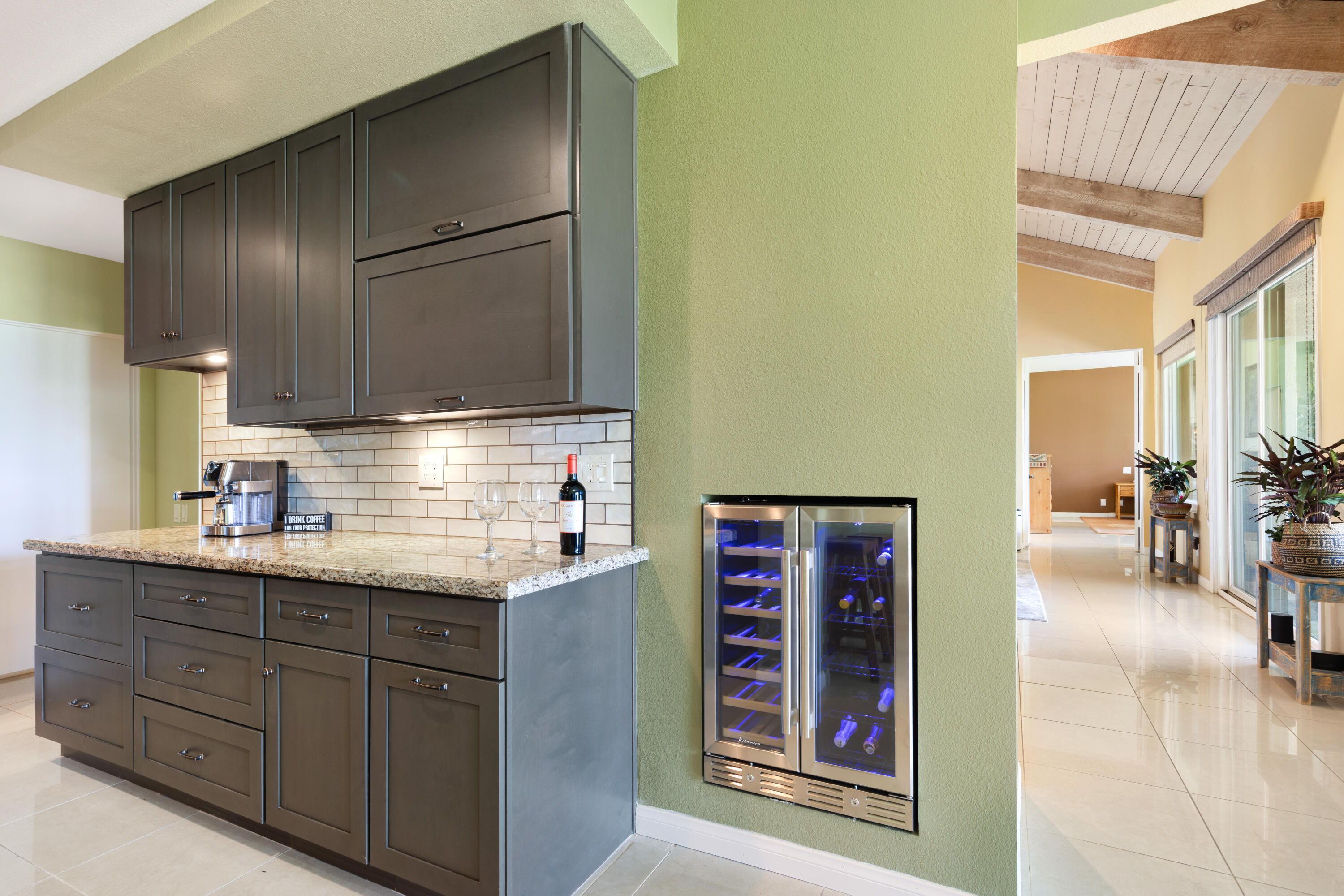 836 Inverness Drive Rancho Mirage, CA 92270 - Photo 8 of 29 a kitchen with stainless steel appliances granite countertop a refrigerator and a sink