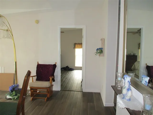 a workspace with furniture and wooden floor