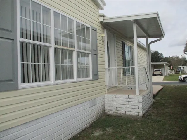 a view of front door and porch