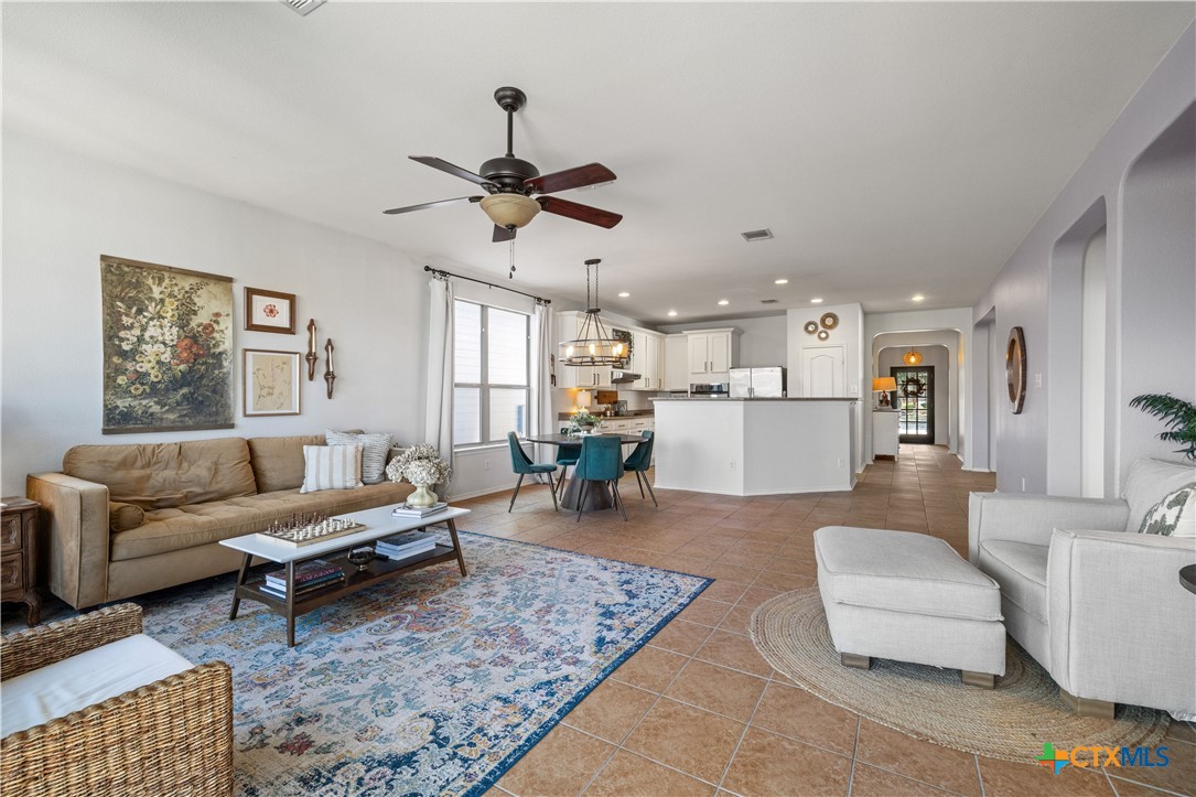 723 Tumbleweed Trail Temple, TX 76502 - Photo 5 of 38 a living room with furniture and a wooden floor