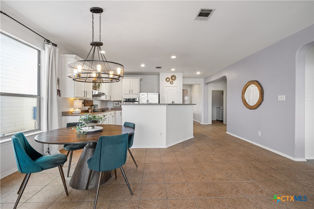 723 Tumbleweed Trail Temple, TX 76502 - Photo 10 of 38 a view of a dining room and livingroom