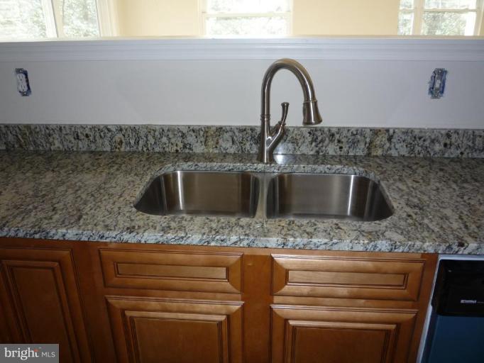 1718 Perry Cove Road Pasadena, MD 21122 - Photo 22 of 29 Upgraded Faucet and Granite Tops in Kitchen