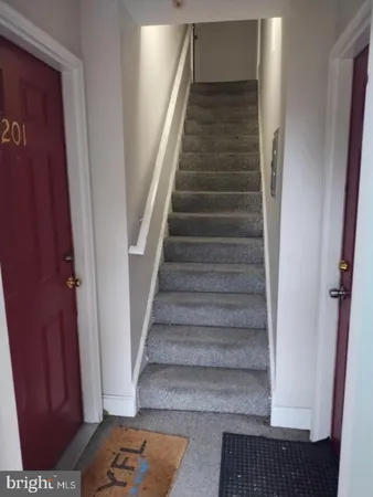 a view of entryway with stairs