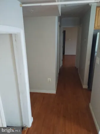 view of a room with wooden floor