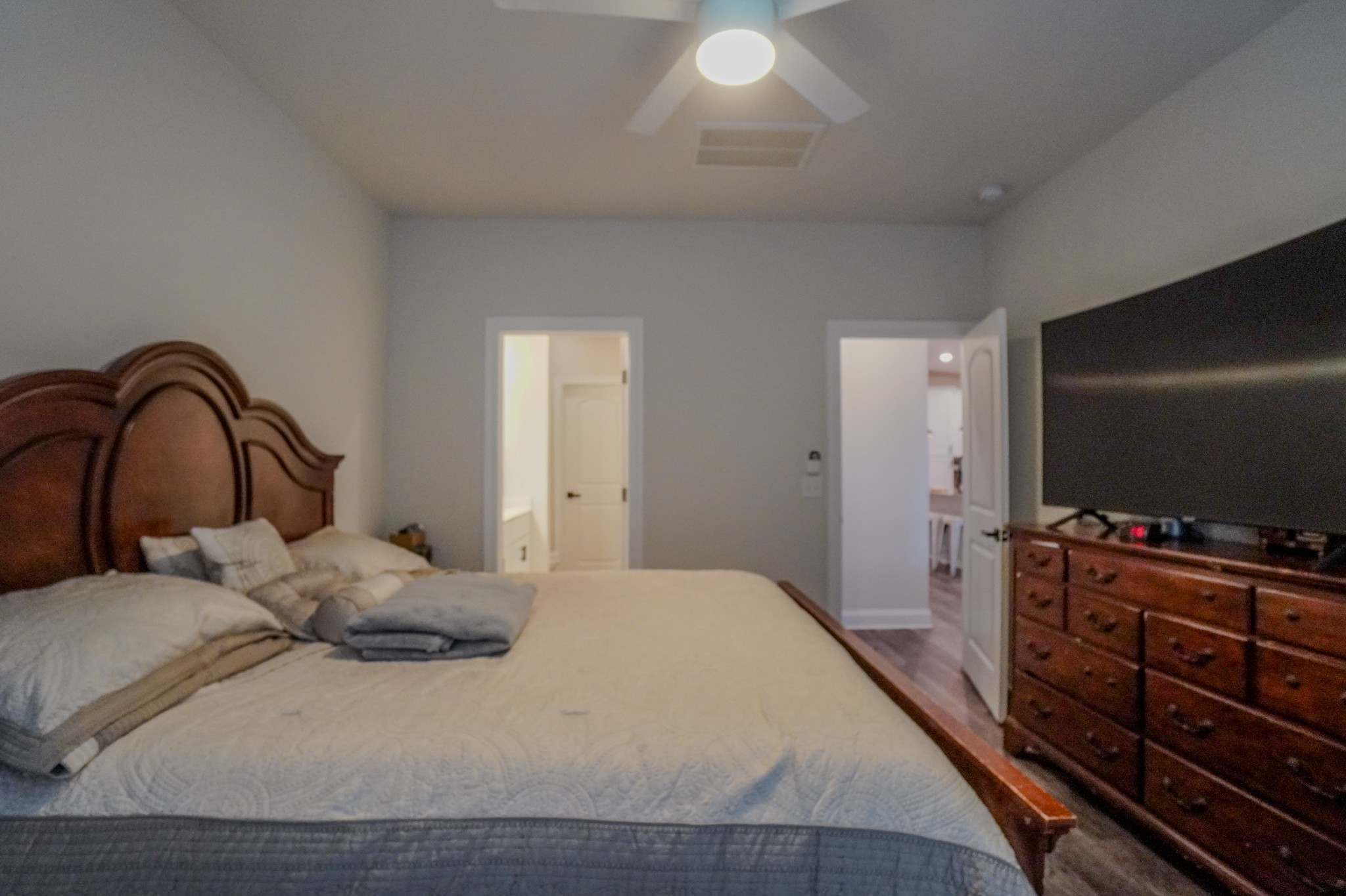 257 Breaking Pen Road Gallatin, TN 37066 - Photo 27 of 58 a bedroom with a bed and a flat screen tv
