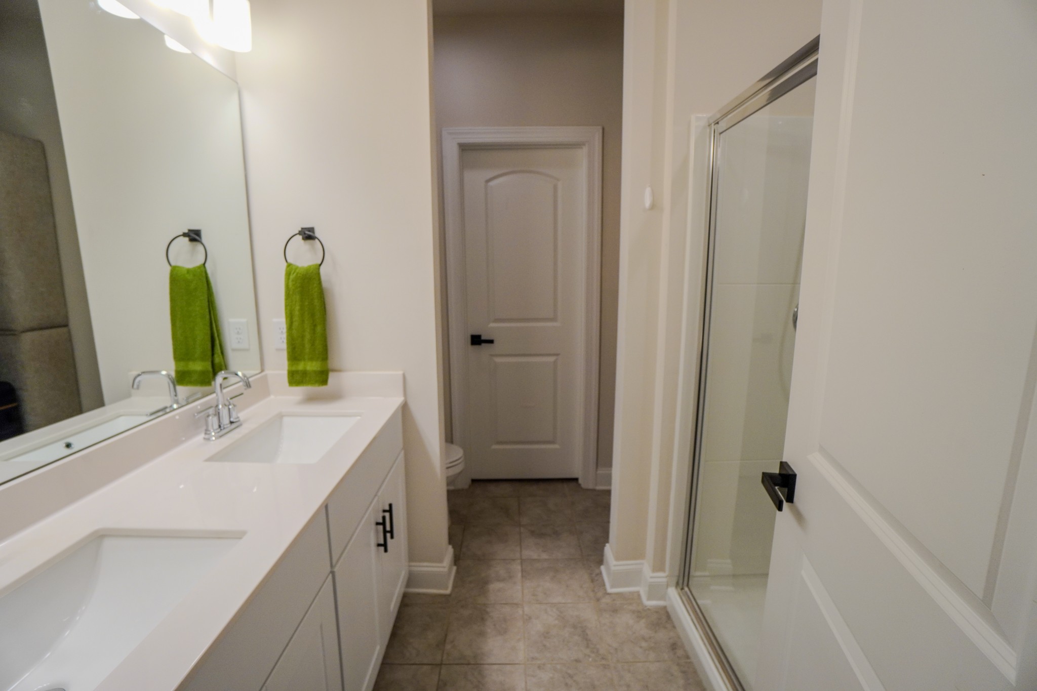 257 Breaking Pen Road Gallatin, TN 37066 - Photo 28 of 58 a spacious bathroom with 2 sink and a mirror