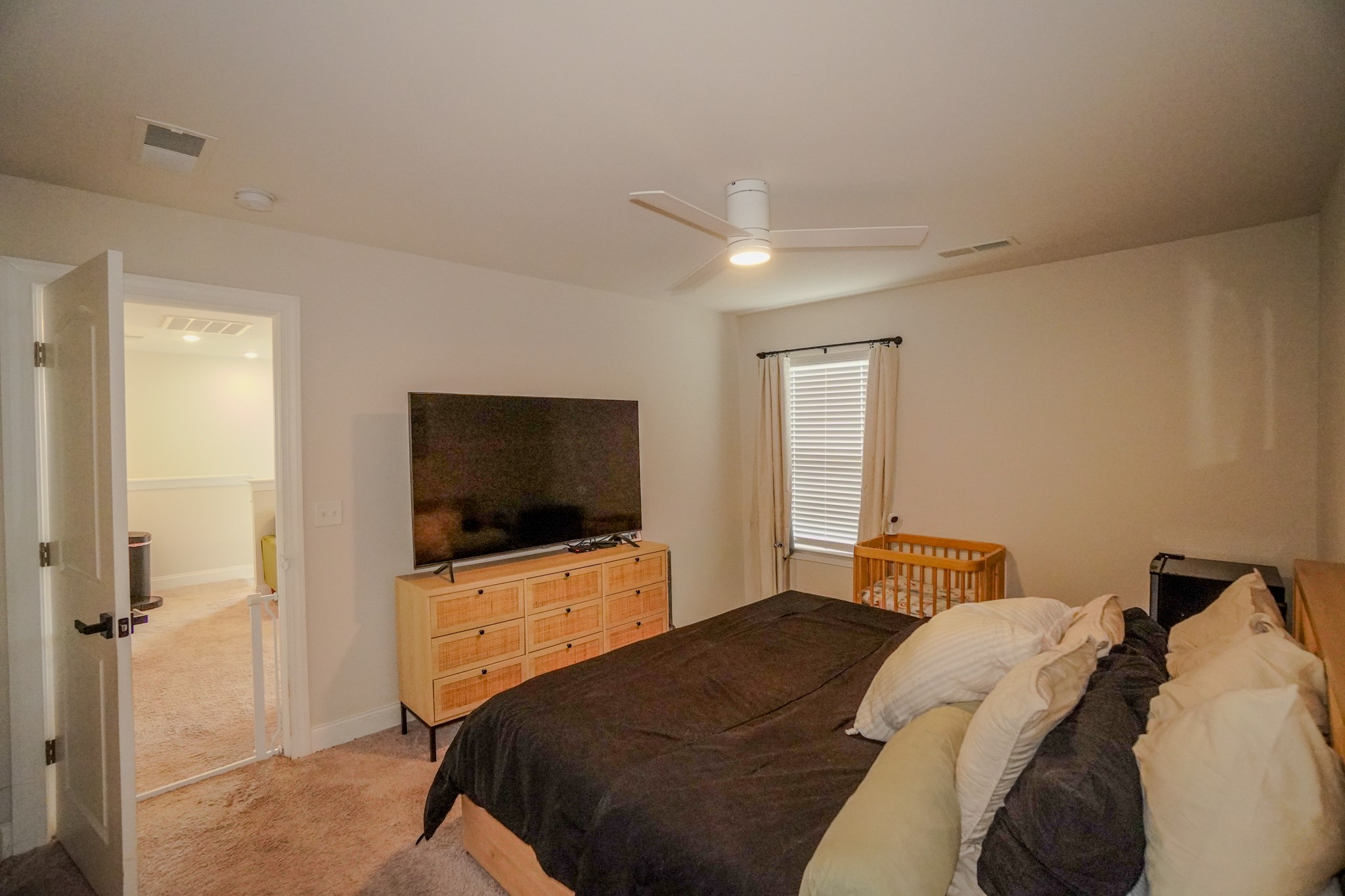 257 Breaking Pen Road Gallatin, TN 37066 - Photo 49 of 58 a bedroom with a bed and a flat screen tv