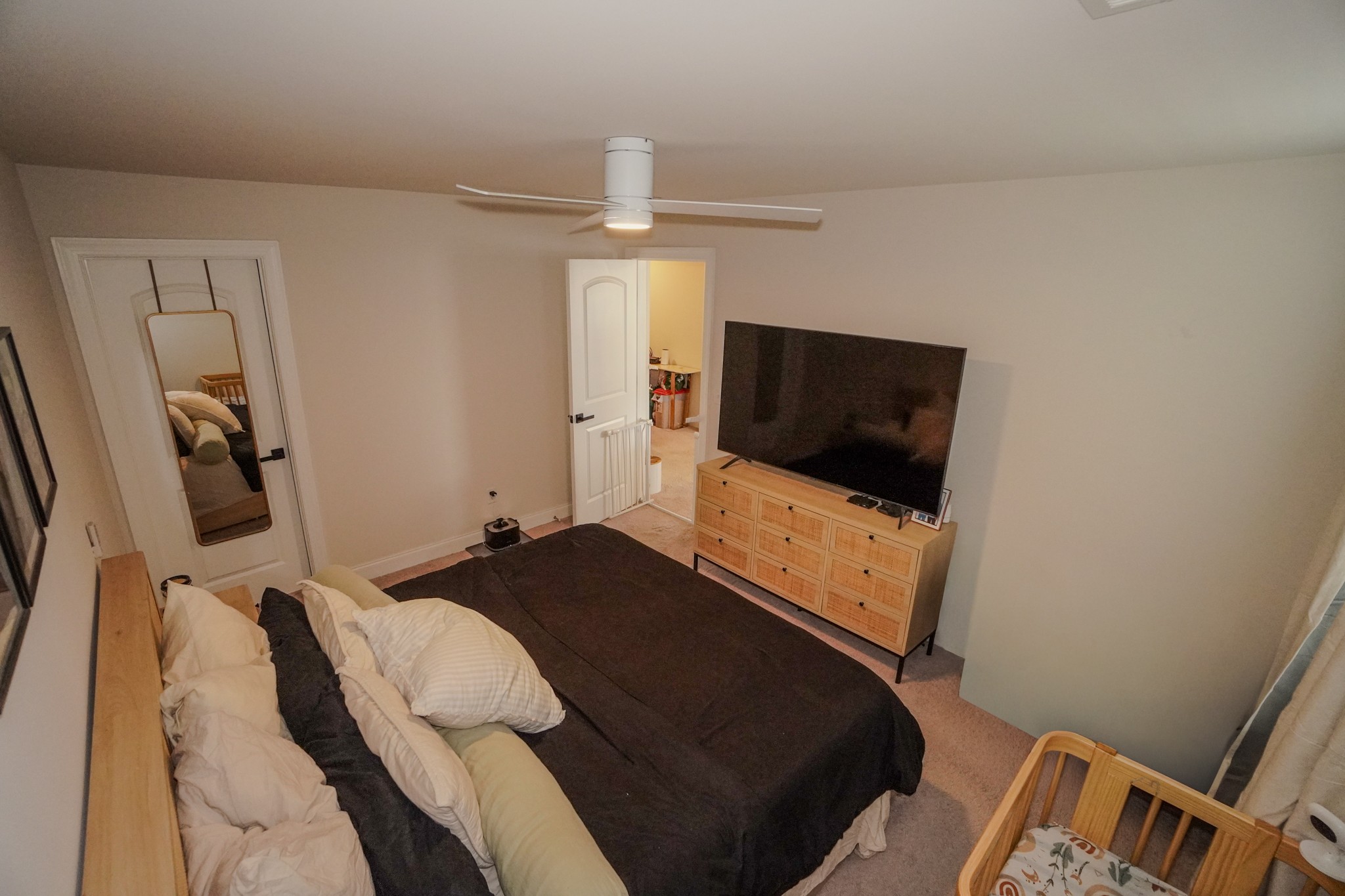 257 Breaking Pen Road Gallatin, TN 37066 - Photo 50 of 58 a bedroom with a bed and a flat screen tv