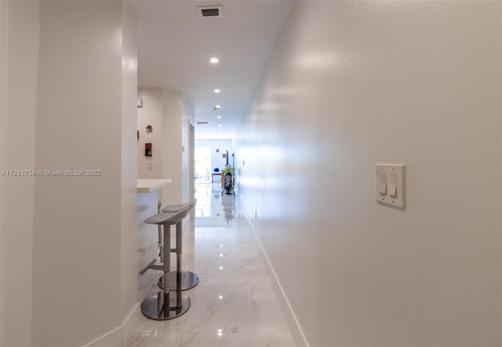 9076 Harding Avenue Surfside, FL 33154 - Photo 11 of 37 a view of entryway and hall