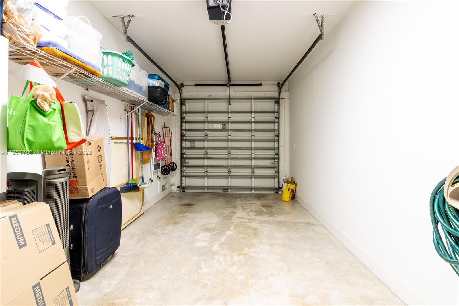 9076 Harding Avenue Surfside, FL 33154 - Photo 13 of 37 a view of storage and utility room