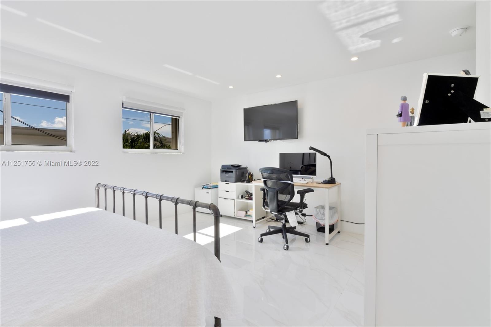 9076 Harding Avenue Surfside, FL 33154 - Photo 22 of 37 a living room with furniture