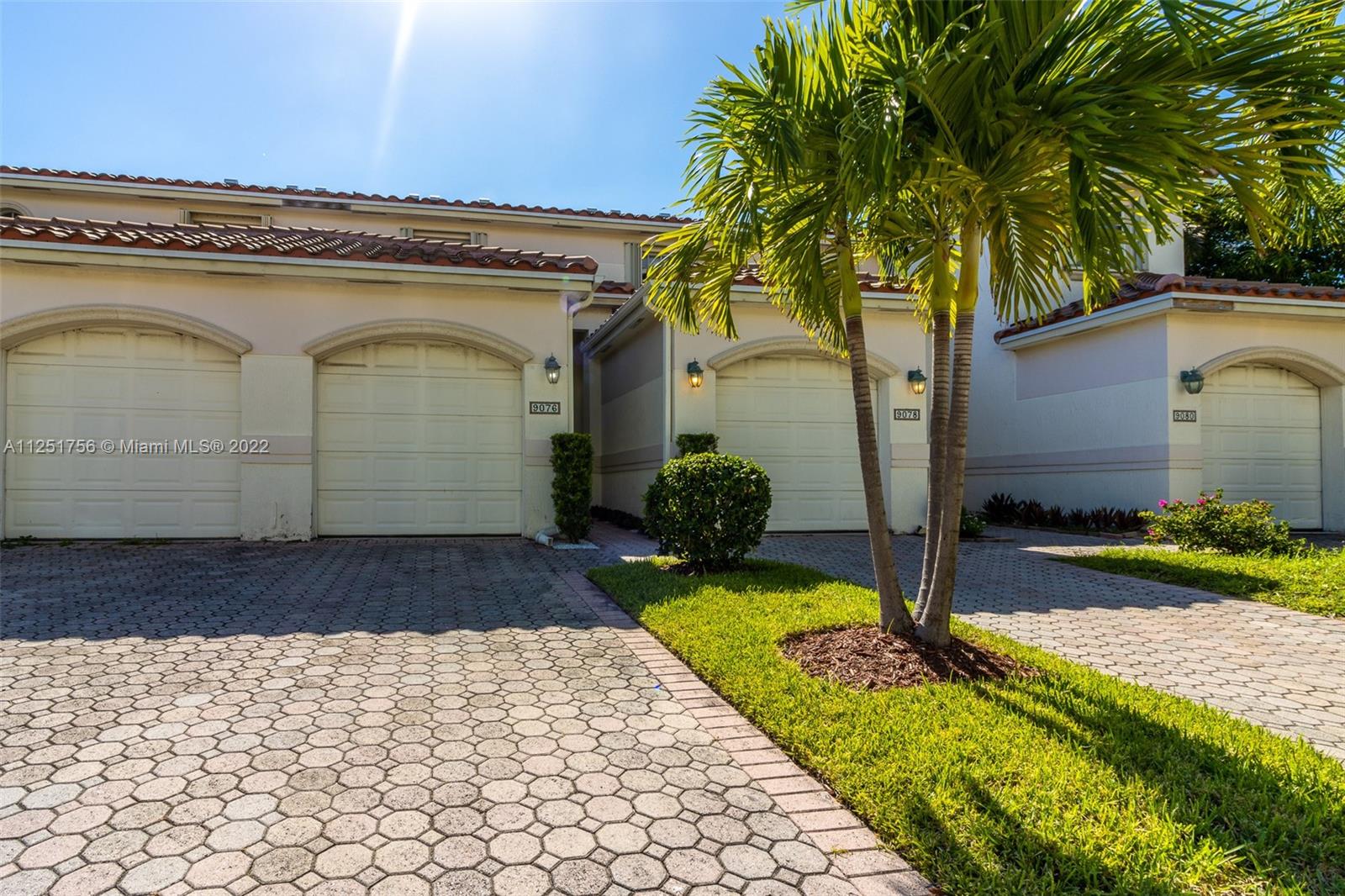 9076 Harding Avenue Surfside, FL 33154 - Photo 33 of 37 a view of a house with a yard