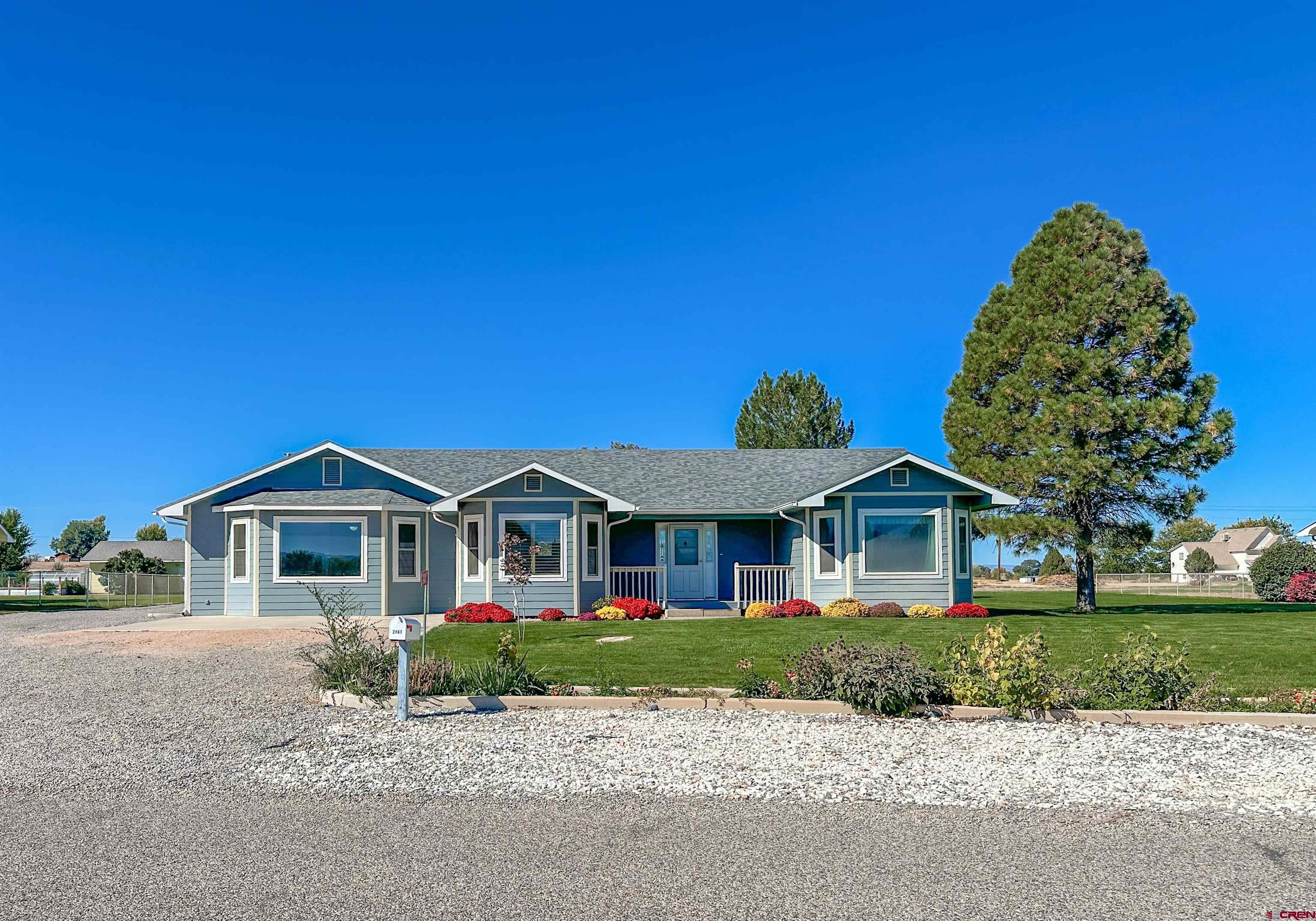 2461 1585 Road Delta, CO 81416 - Photo 45 of 45 a front view of a house with a yard