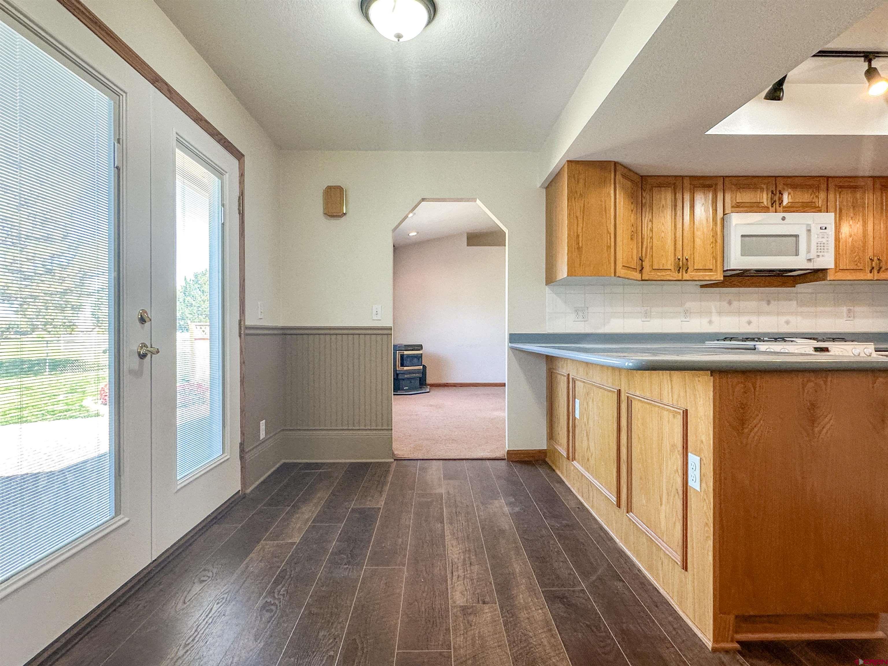 2461 1585 Road Delta, CO 81416 - Photo 5 of 45 a view of a kitchen with a sink and a window