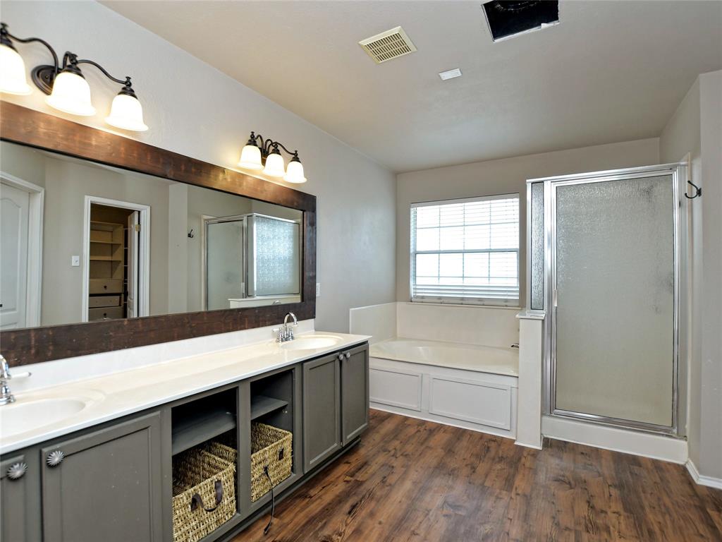 3031 Bent Tree Loop Round Rock, TX 78681 - Photo 17 of 28 The primary bathroom has a double vanity.