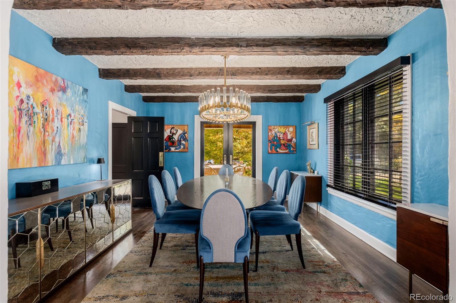 353 Bellaire Street Denver, CO 80220 - Photo 13 of 50 a view of a dining room with furniture window and wooden floor