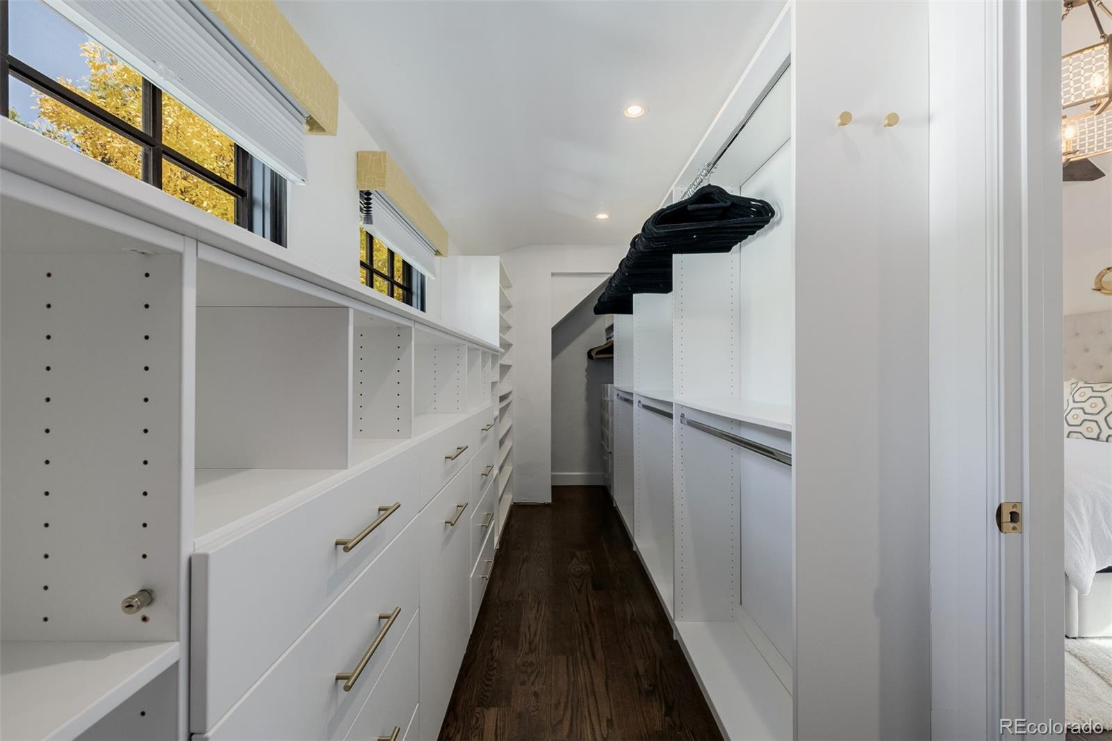 353 Bellaire Street Denver, CO 80220 - Photo 25 of 50 a view of entryway and hall with wooden floor