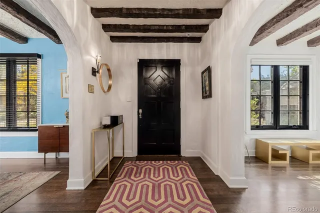 a living room with furniture and a table