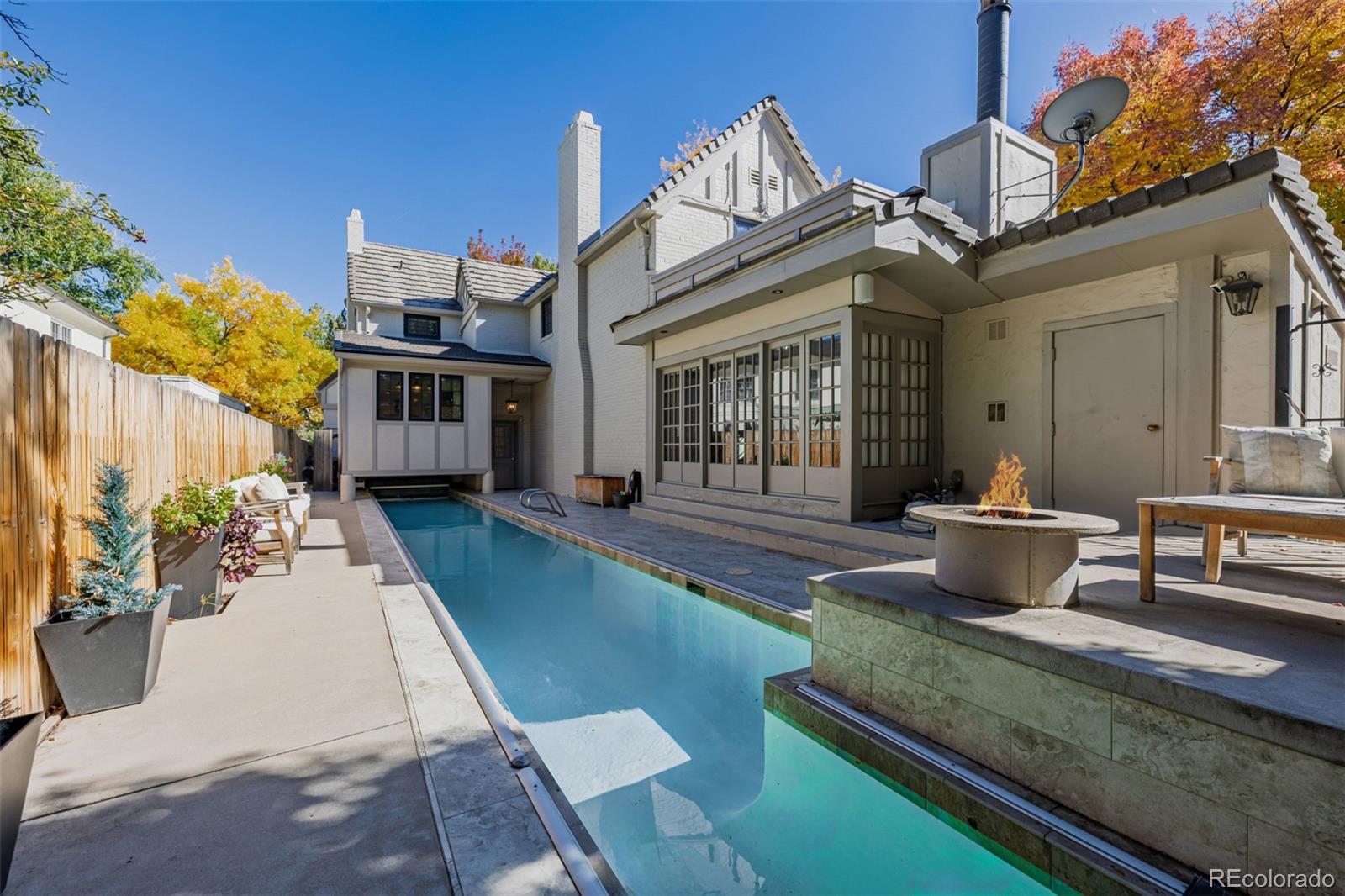 353 Bellaire Street Denver, CO 80220 - Photo 39 of 50 a view of a house with backyard porch and sitting area