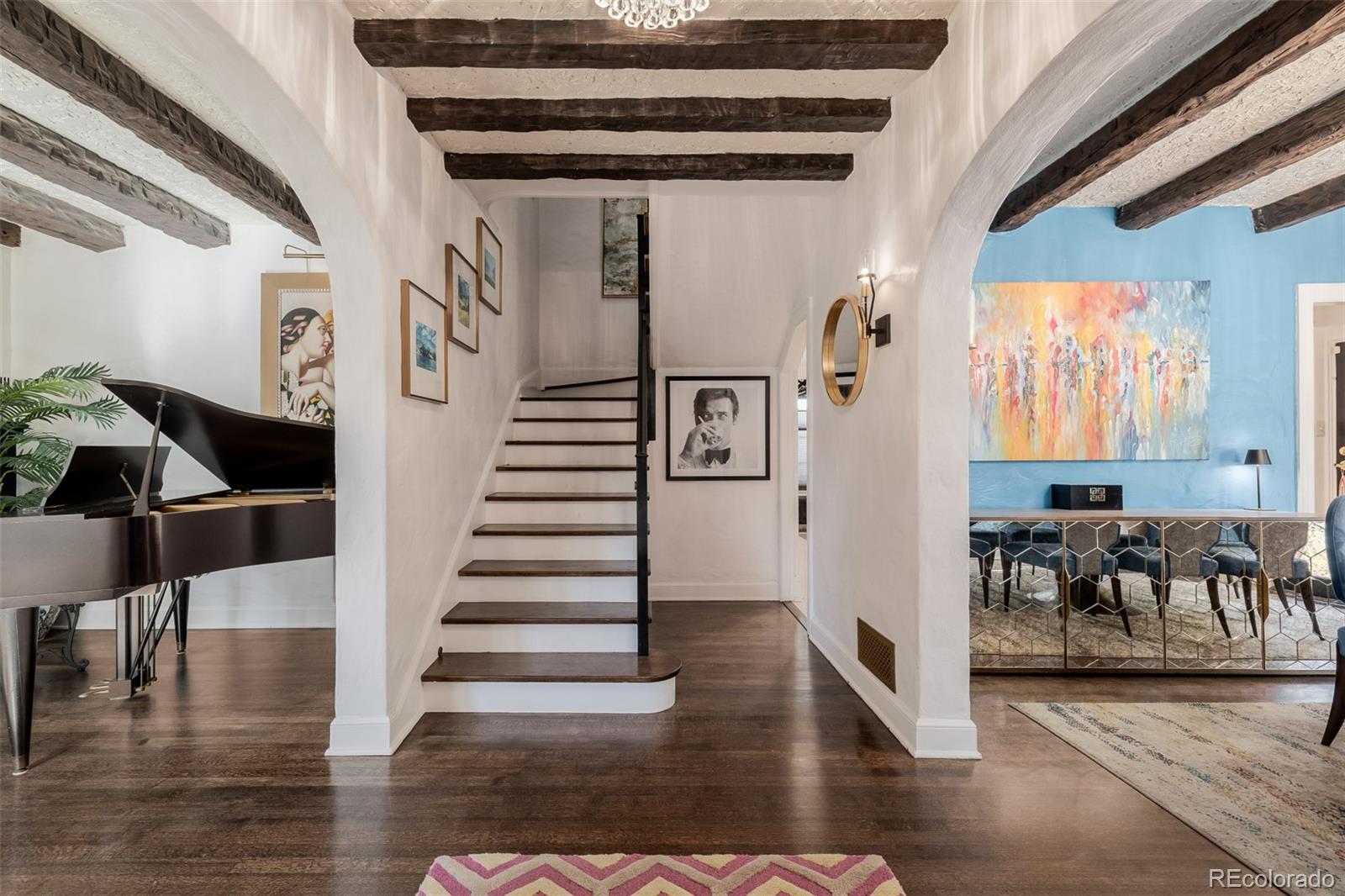 353 Bellaire Street Denver, CO 80220 - Photo 4 of 50 a view of entryway and hall with wooden floor