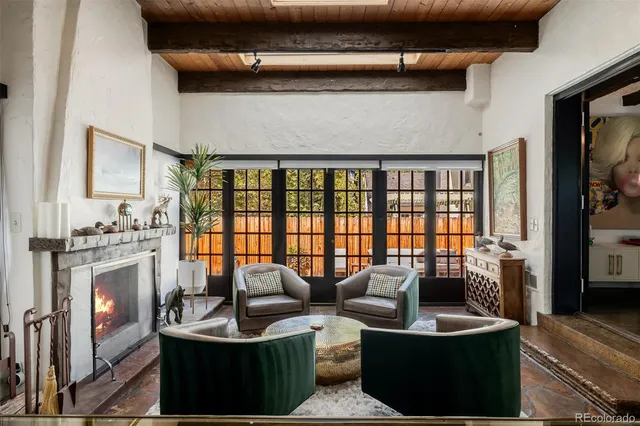 a kitchen with a sink a stove a microwave and cabinets