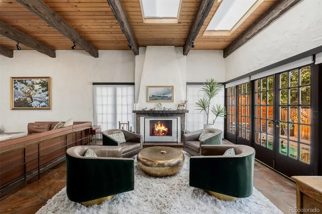 a bathroom with a sink a mirror and shower