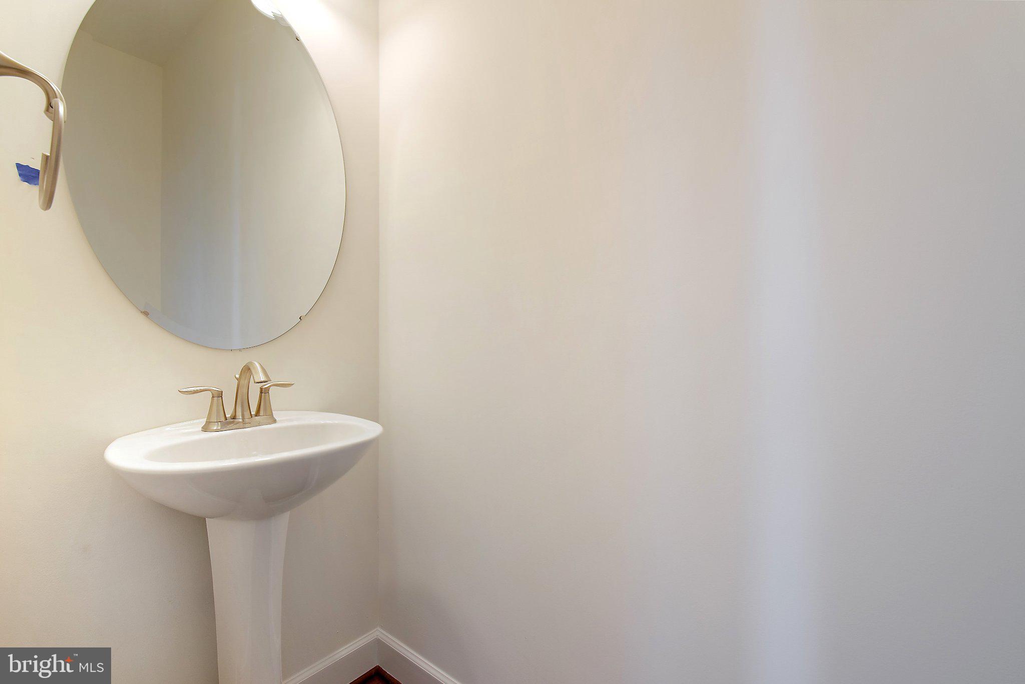 53 Bright Lane Hanover, PA 17331 - Photo 10 of 21 a bathroom with a sink and a mirror