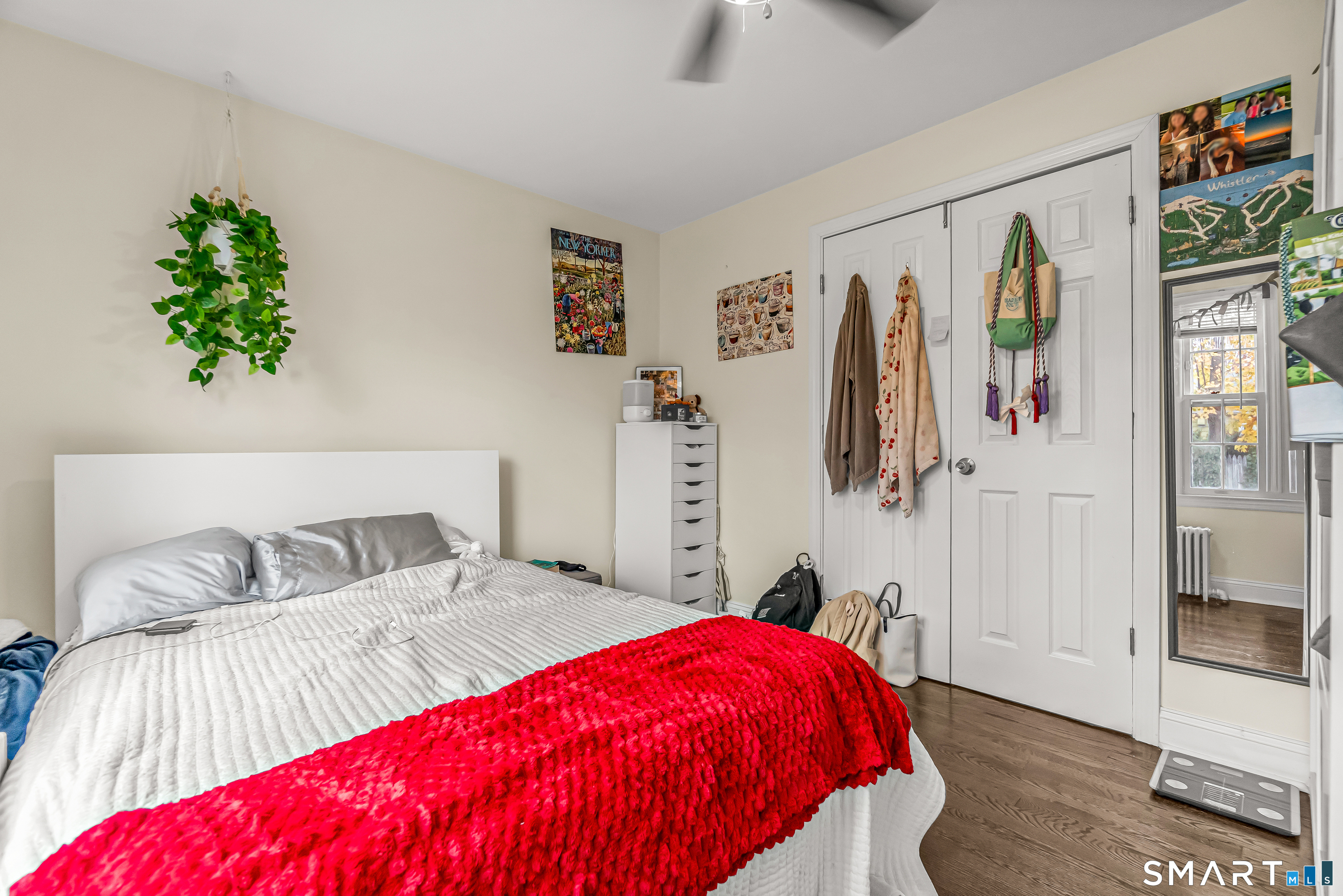 619 Queen Street Bridgeport, CT 06606 - Photo 13 of 16 a bedroom with a bed and a couch