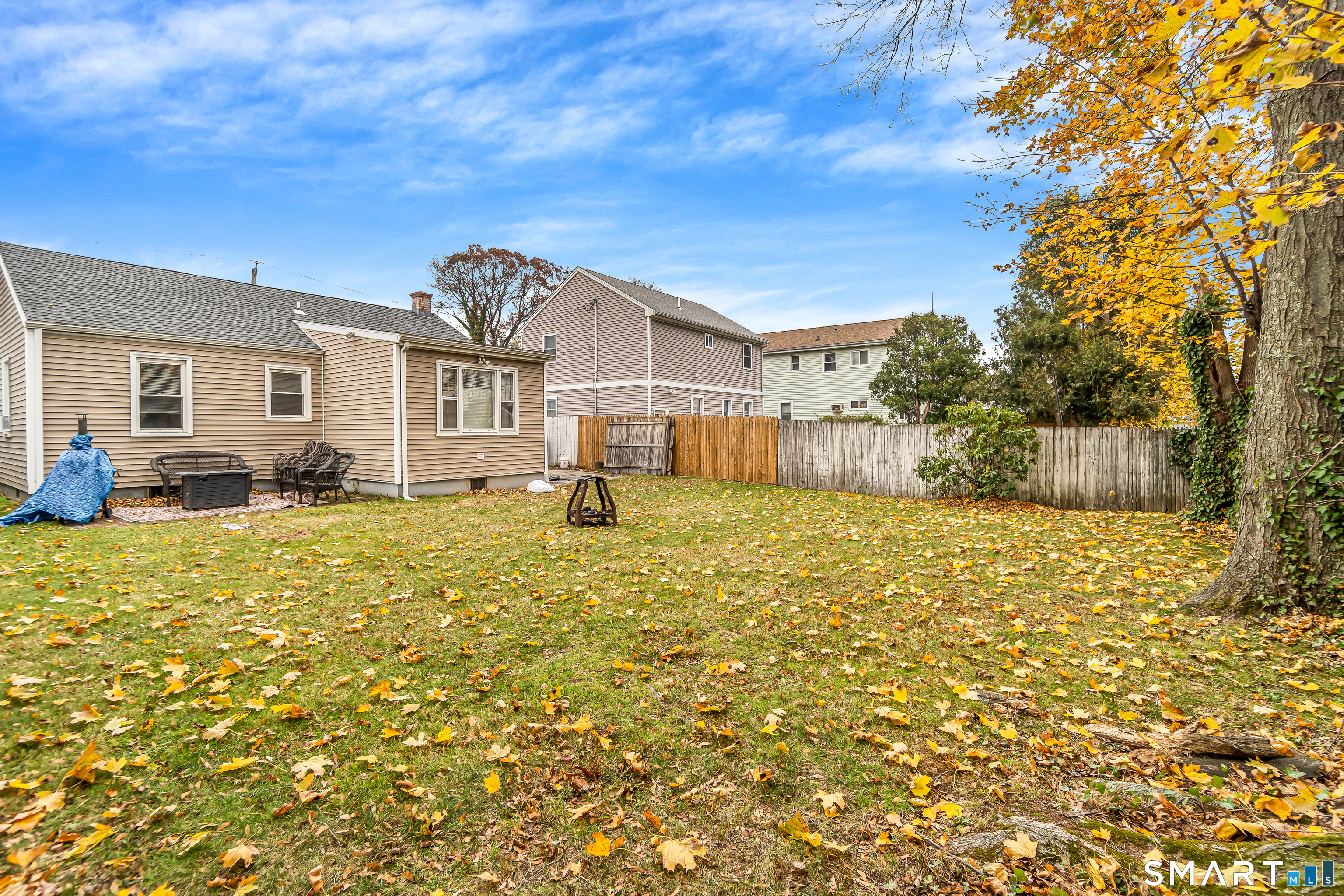 619 Queen Street Bridgeport, CT 06606 - Photo 15 of 16 a front view of house with yard and seating