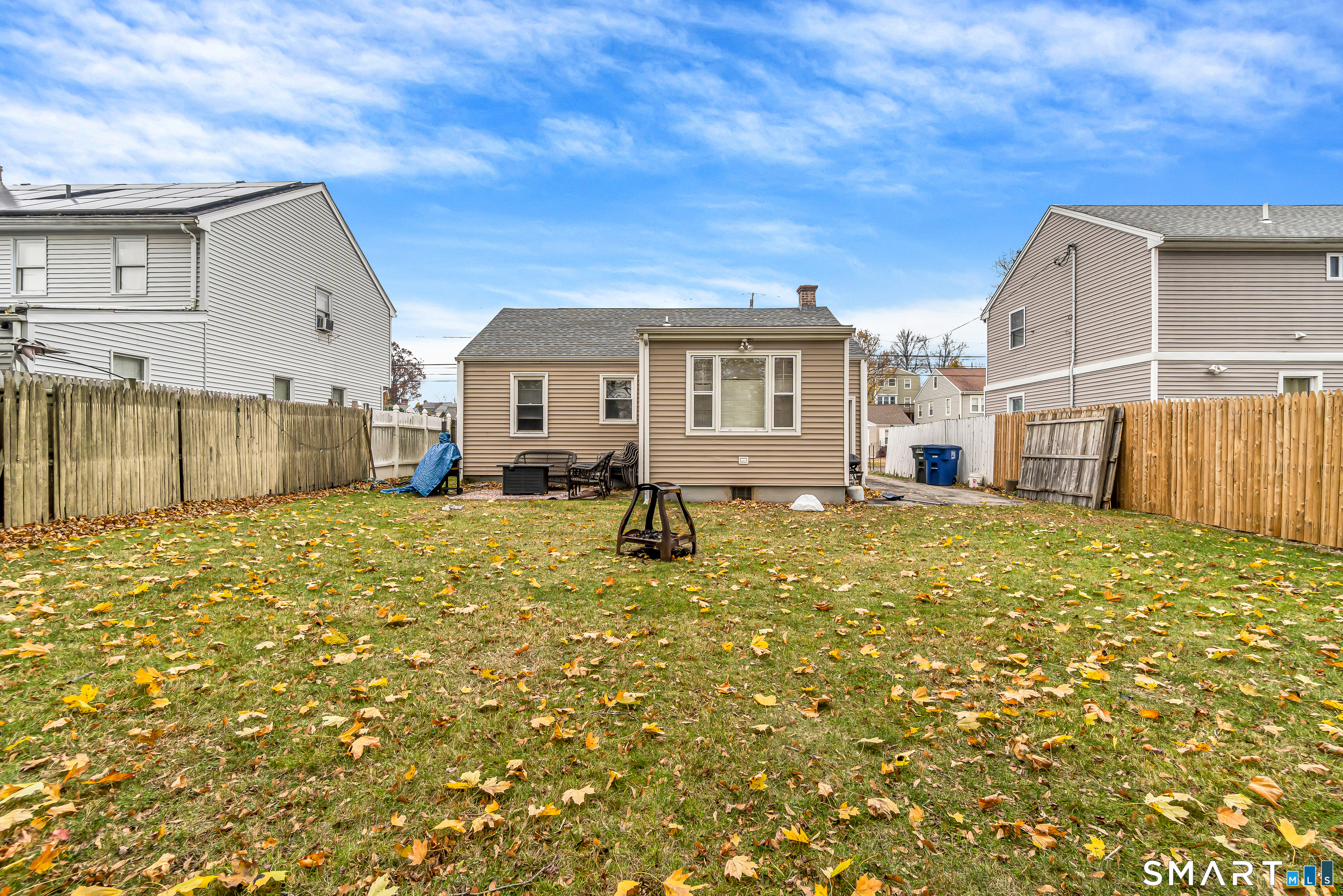 619 Queen Street Bridgeport, CT 06606 - Photo 16 of 16 a view of a house with a backyard