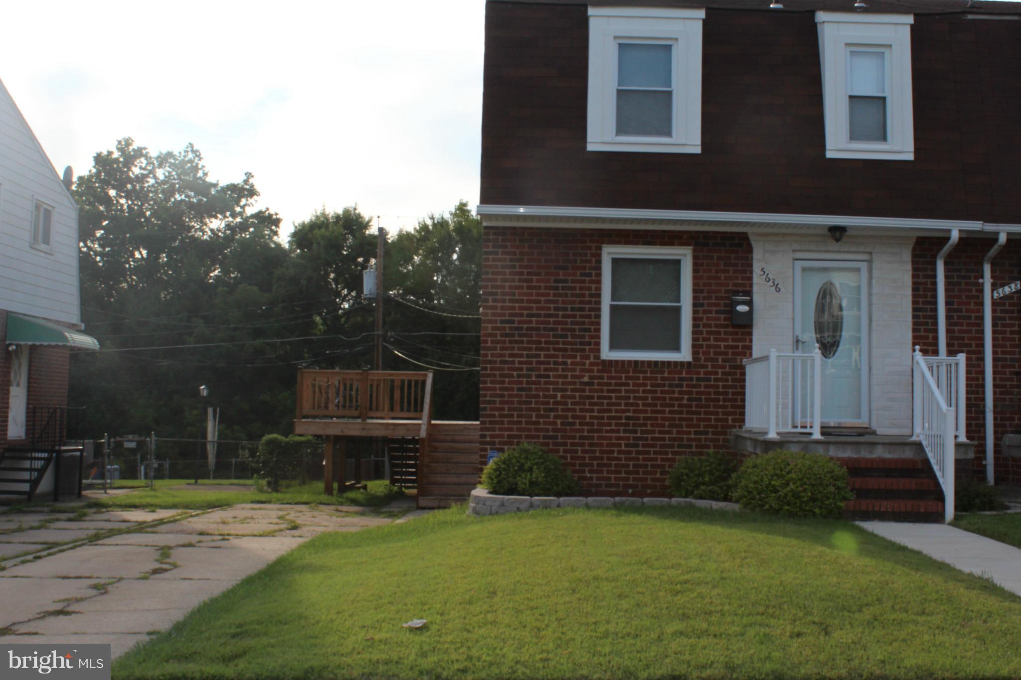5636 Whitby Road Baltimore, MD 21206 - Photo 1 of 17 a front view of a house with a yard