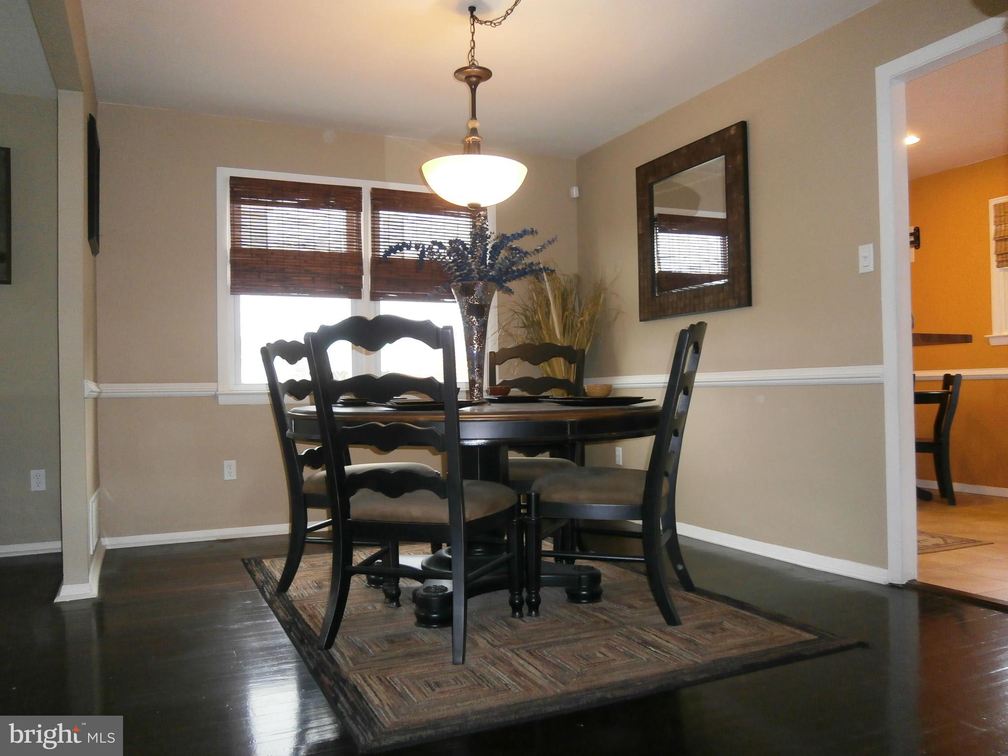 5636 Whitby Road Baltimore, MD 21206 - Photo 3 of 17 a view of a dining room with furniture and window