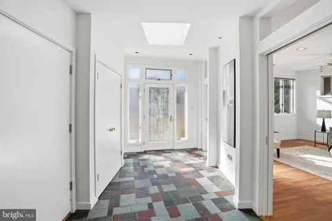 a kitchen with a stove a sink and a refrigerator