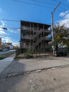 a view of a house with a street