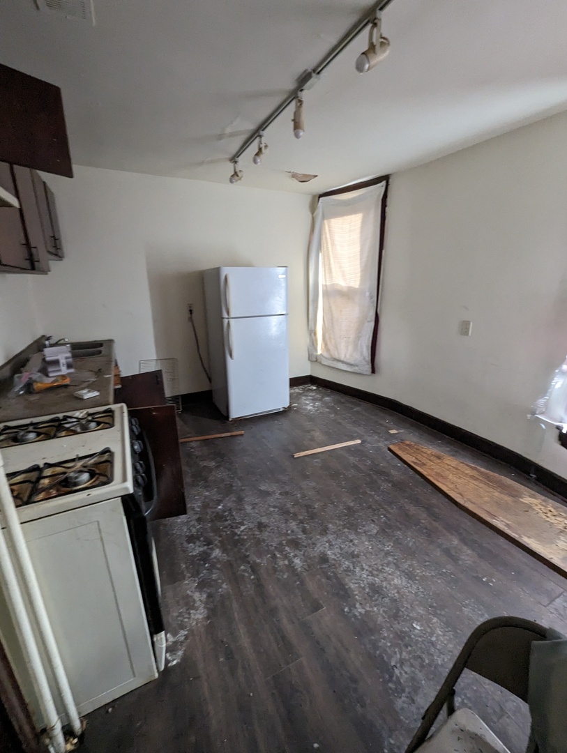 7157 South Yale Avenue Chicago, IL 60621 - Photo 6 of 8 a view of a storage & utility room in a house
