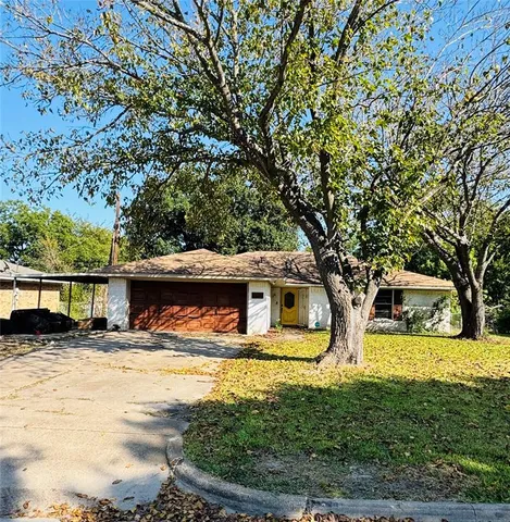 a view of a swimming pool with an outdoor seating