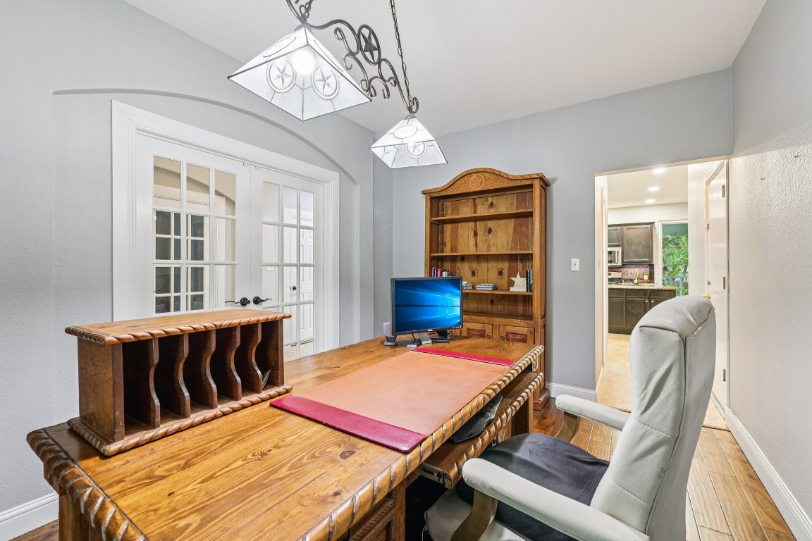 1108 Dalea Bluff Round Rock, TX 78665 - Photo 17 of 40 a bed room with furniture and a chandelier